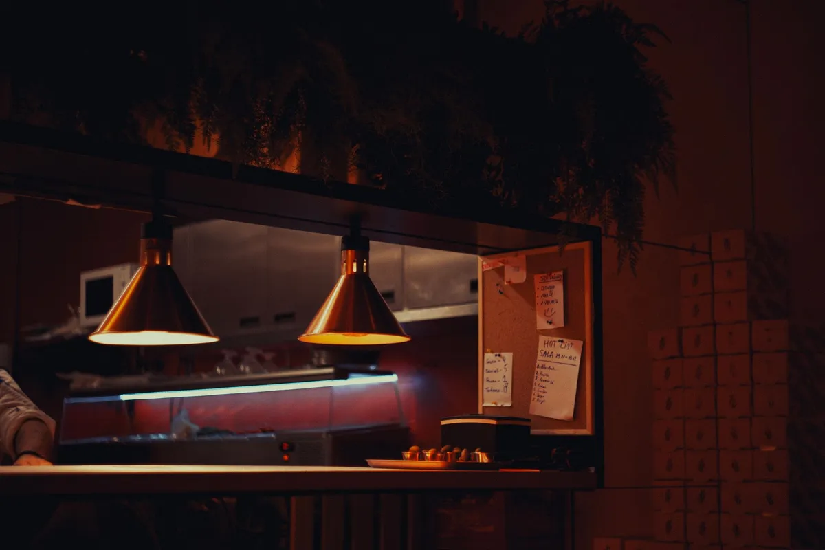 Heat lamps used in acupuncture treatments to relieve back pain and enhance healing.